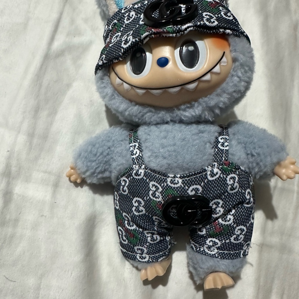 Cute Plush Toy with Overalls. Not a real Labubu. But looks really close.